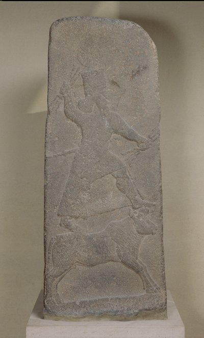 Stele depicting the storm-god Adad standing on his bull and brandishing lightning bolts, from the Temple of Ishtar, Arslan Tash (Hadatu) by Assyrian